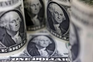 Dollar Boosted by Trade Hopes and Rising Bond Yields