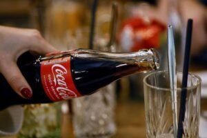 Coca-Cola’s performance exceeds expectations due to price increases and a surge in demand.