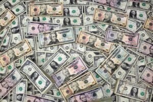 Dollar poised for its first weekly increase since March amid indications of reduced US-China tensions.