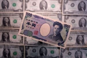 Japanese official advocates for a stronger yen, advises against selling Treasuries in Tokyo.