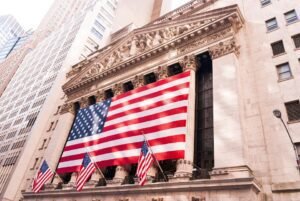 Traders speculate that the Federal Reserve will reduce interest rates by a minimum of four times this year to support the economy.