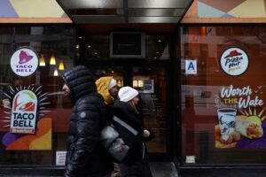 Yum Brands, the parent company of KFC, exceeds sales projections as Taco Bell maintains strong demand.
