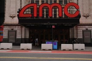 AMC Entertainment reports a decline in revenue due to reduced theater attendance.