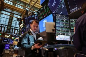 Wall Street futures dip following court decision to restore Trump tariffs.